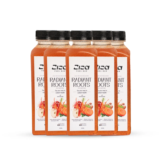 Pack of Radiant Roots Cold pressed juice bottles on a white background